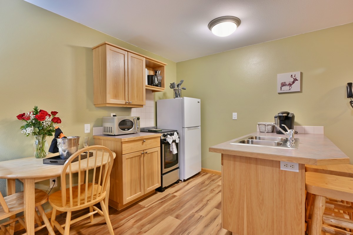 Fully equipped modern kitchen in an Estes Park vacation rental Riverview Suite